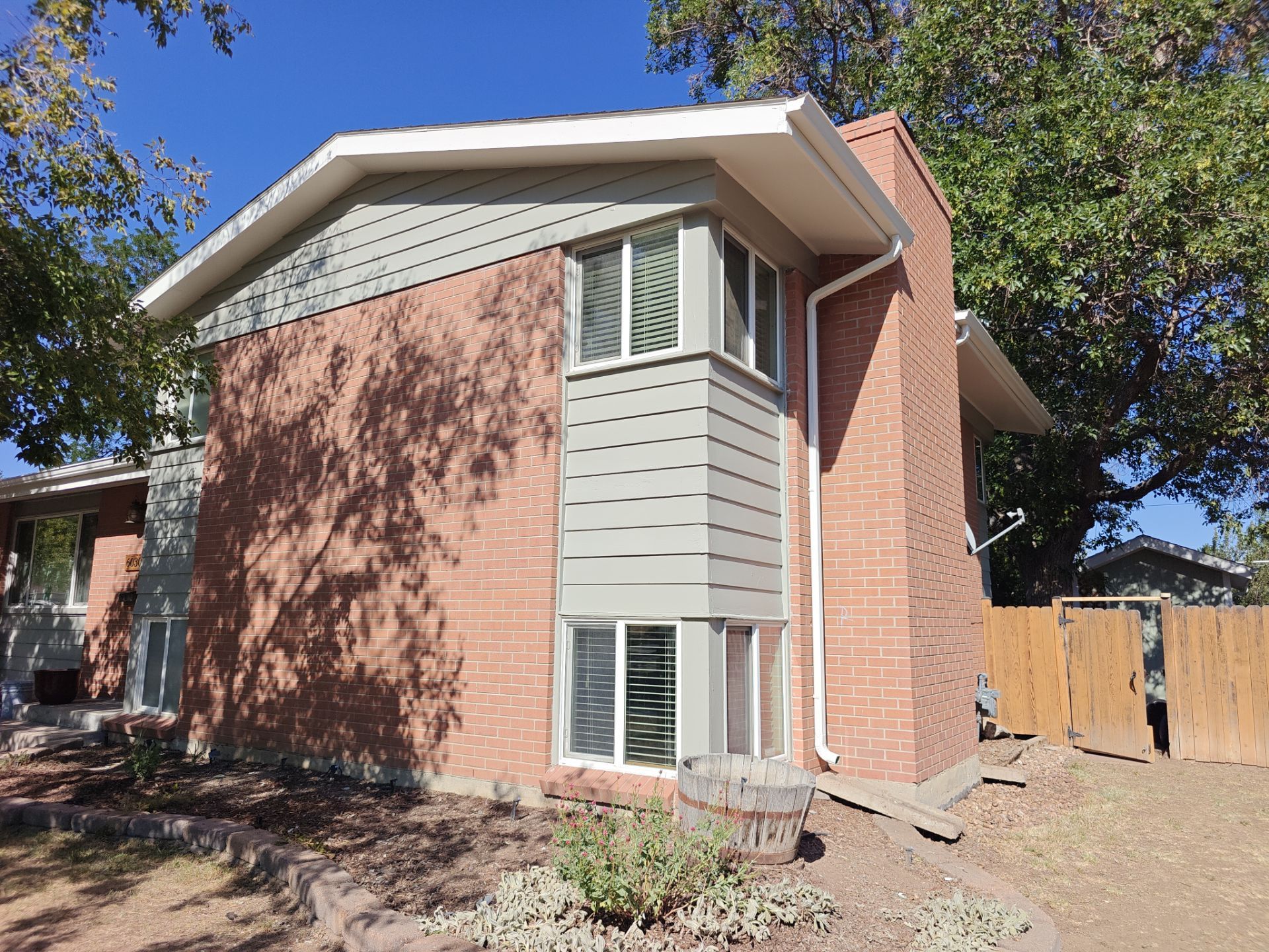 After: the same Arvada home with fresh, updated exterior paint