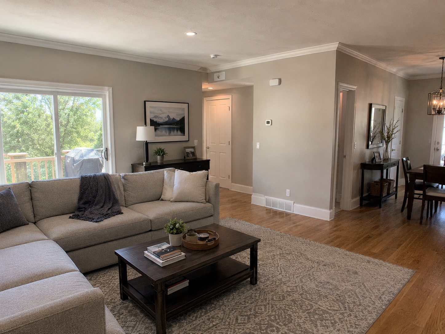 Living room repainted in a fresh, modern neutral color during an interior painting project in Arvada, Colorado